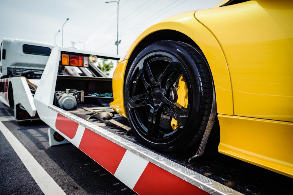 Difference Between Flatbed Toe Truck and Car Carrier Trailer