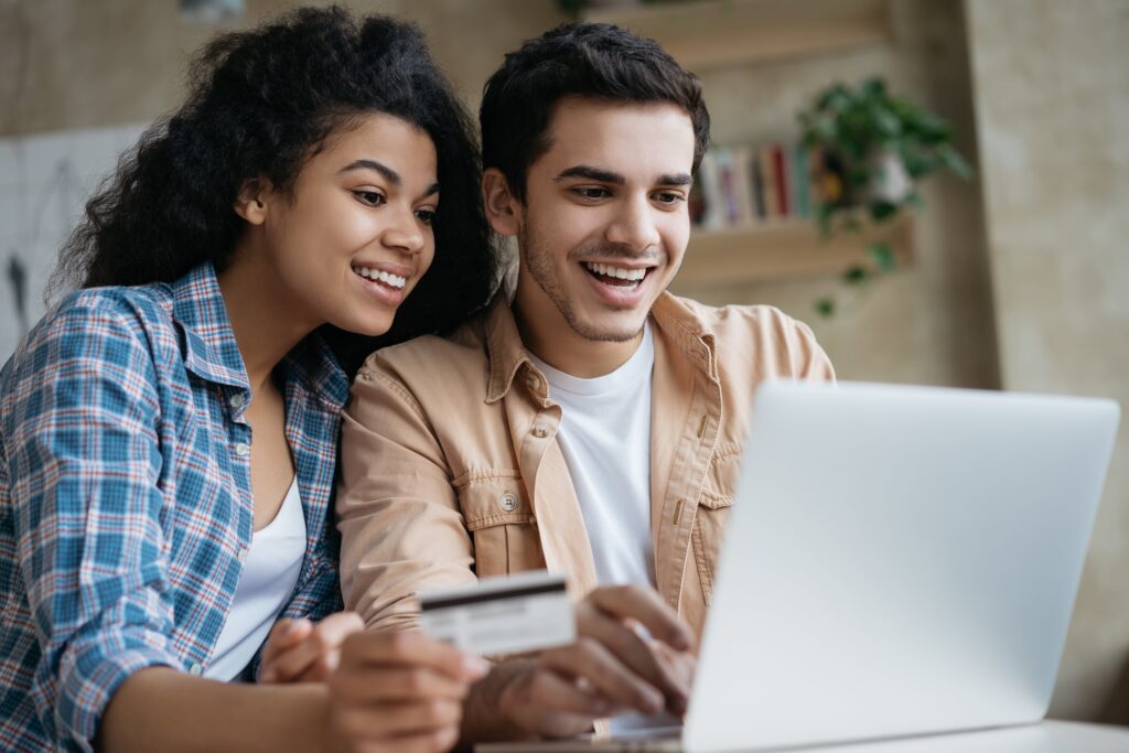 Multiracial couple buying a car on CarGurus