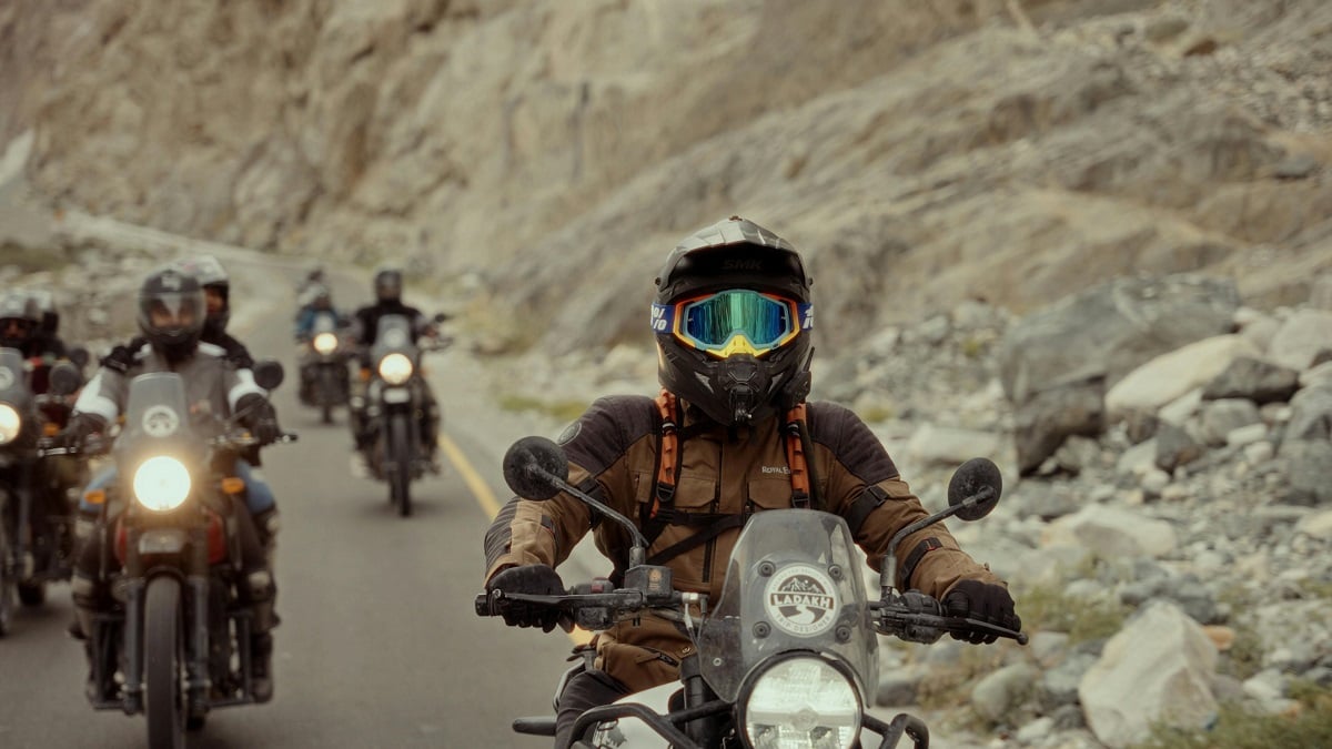 Group of motorcyclists riding on a scenic road, capturing the adventurous spirit of Daytona Bike Week 2025