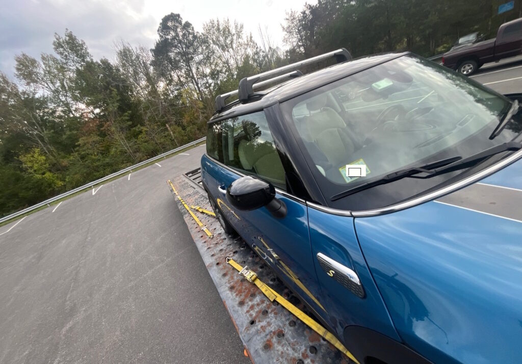 mini cooper delivery hauler loading